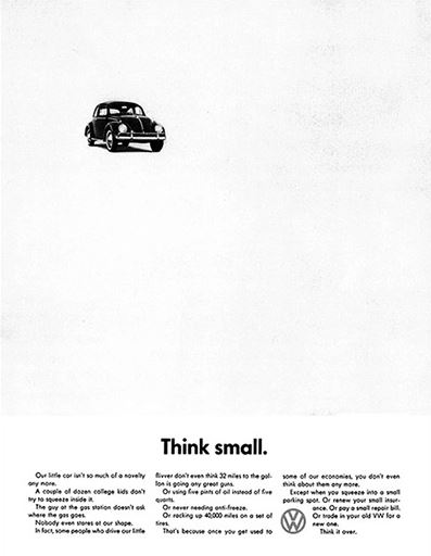 Propaganda antiga da Volkswagen. Há um Fusca preto na página e o texto: “Lemon.”